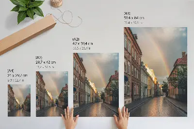 Póster edificios de apartamentos coloridos con arcoíris bajo un cielo nublado