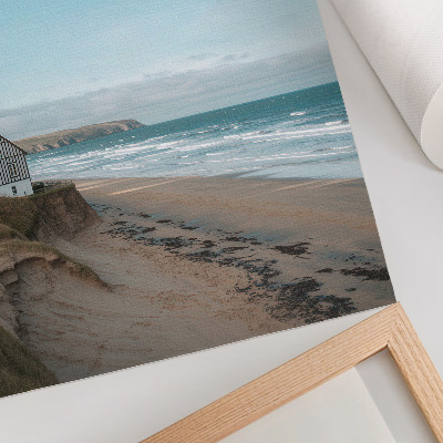 Póster Playa, olas, casa en un acantilado, colores pastel