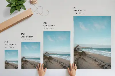 Póster playa con olas y casa en un acantilado en colores pastel