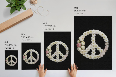 Póster Flores con forma de símbolo de la paz sobre un fondo negro.