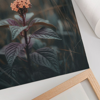 Póster Una planta con una flor colorida sobre un fondo verde.