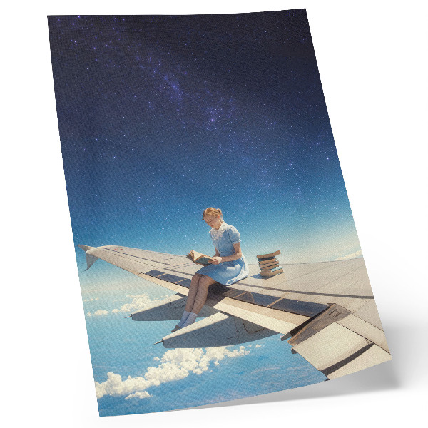 Lienzo decorativo moderno Libros del universo de la chica en el ala de un avión