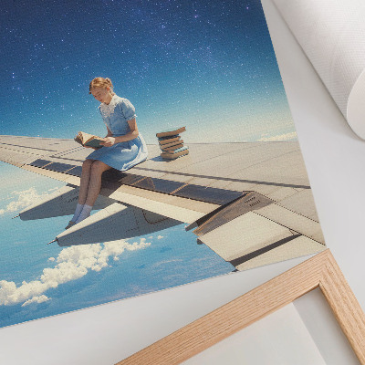 Lienzo decorativo moderno Libros del universo de la chica en el ala de un avión