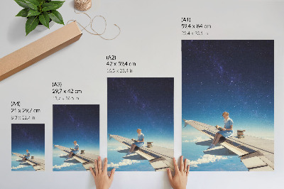Lienzo decorativo moderno Libros del universo de la chica en el ala de un avión