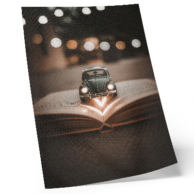 Lámina artística de alta calidad Cochecito en miniatura sobre un libro con luces mágicas