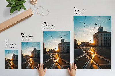 Póster La puesta de sol sobre la ciudad con su arquitectura