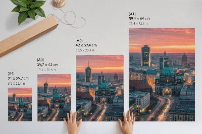 Póster con colores saturados Ciudad moderna al anochecer con iluminación cálida