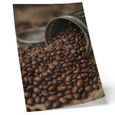 Póster con colores saturados Granos de café en una composición dispersa directamente de la lata.