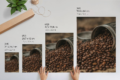 Póster con colores saturados Granos de café en una composición dispersa directamente de la lata.