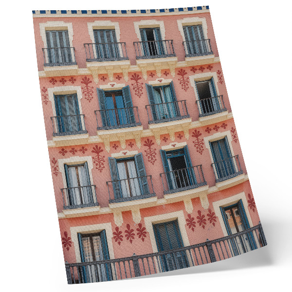Lienzo decorativo moderno fachada simétrica con contraventanas azul marino y decoraciones florales