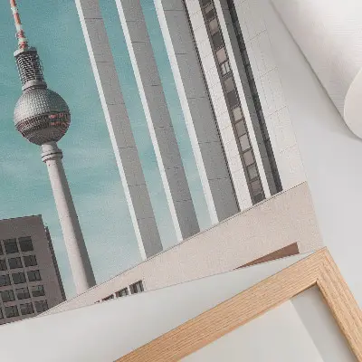 Lienzo decorativo moderno torre minimalista con edificios modernos bajo un cielo azul