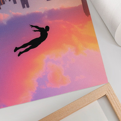 Póster La silueta de una ciudad moderna contra un cielo colorido
