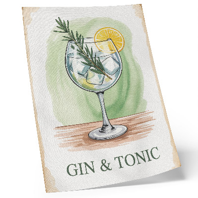 Lámina artística de alta calidad Un vaso de ginebra, romero y limón sobre un fondo verde.