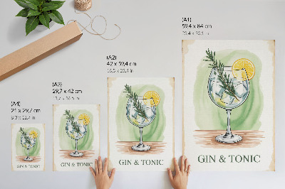 Lámina artística de alta calidad Un vaso de ginebra, romero y limón sobre un fondo verde.