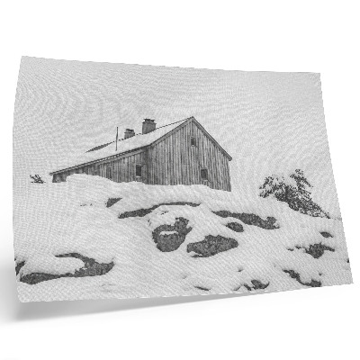 Arte de pared Una casa de invierno minimalista con la nieve como telón de fondo.
