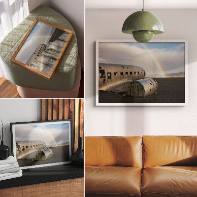 Arte de pared Los restos metálicos de un avión con un arcoíris de fondo.