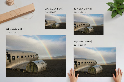 Arte de pared Los restos metálicos de un avión con un arcoíris de fondo.