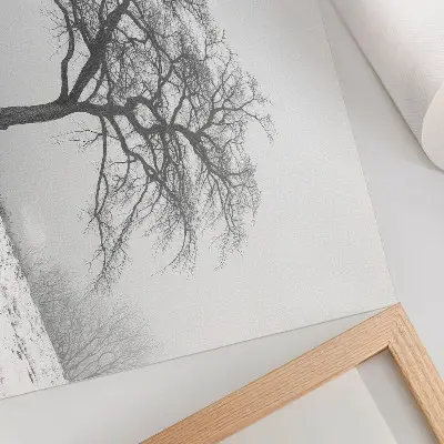 Arte de pared árbol solitario en un paisaje de paz invernal con estilo minimalista y armonioso