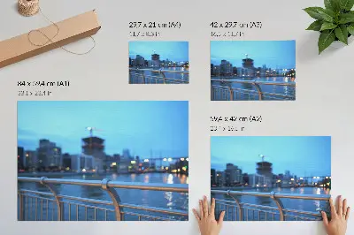 Arte de pared el paseo marítimo de la ciudad al atardecer con luces desenfocadas