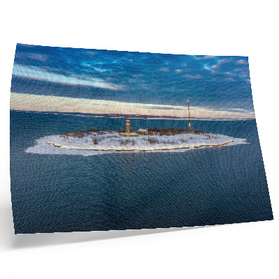 Lámina para cuadro Isla invernal con faro y mar azul