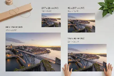 Arte de pared cuadro de puente con el sol poniente y la ciudad de fondo