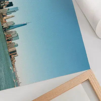 Lámina para cuadro rascacielos modernos con cielo azul y masa de agua