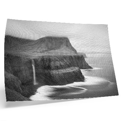 Póster Un paisaje tranquilo con una cascada y montañas.