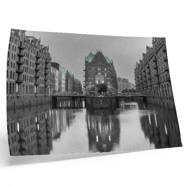 Póster canal con edificios industriales y reflejos en el agua