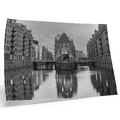 Póster Canal con edificios industriales, reflejos en el agua