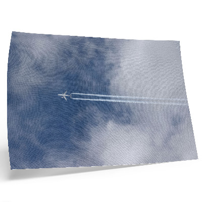 Arte de pared Avión en el cielo azul con estelas blancas