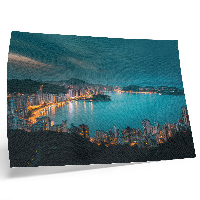 Arte de pared Vista nocturna de la ciudad sobre el agua, rascacielos luminosos.