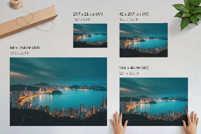 Arte de pared Vista nocturna de la ciudad sobre el agua, rascacielos luminosos.