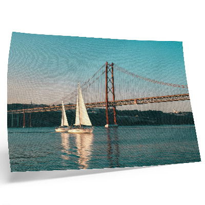 Lámina para cuadro Un puente y veleros sobre el agua en tonos pastel.