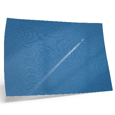 Póster Avión en el cielo azul con un ambiente dinámico