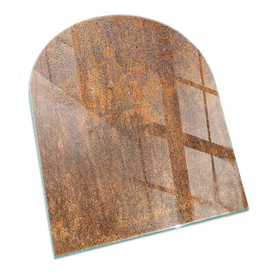 Placa protectora suelo estufa semi-ovalada Textura de óxido en el fondo.