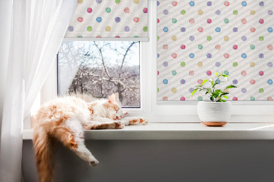 Modern roller blind con un estampado de puntos de colores