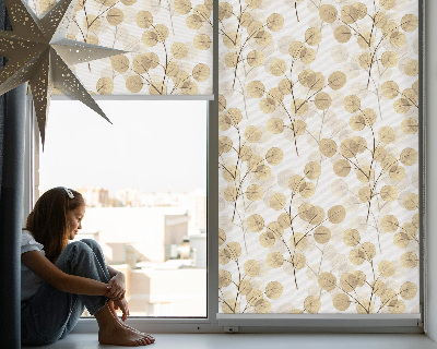 Modern roller blind con un estampado de ramas en tonos amarillos
