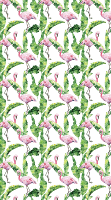 Estor enrollable de tela con estampado de flamencos junto a las hojas