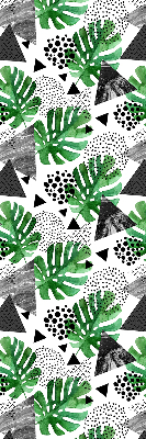 Estor decorativo con diseño de hojas, triángulos y puntos
