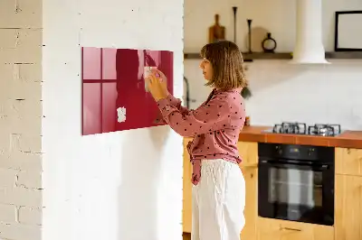 Pizarra magnética con rotulador de color rojo