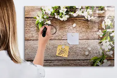 Pizarra de cristal magnética borrable con diseño de flores sobre madera