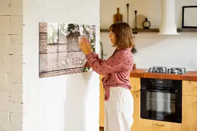Pizarra de cristal magnética borrable con diseño de flores sobre madera