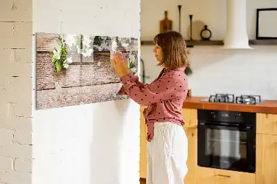Pizarra de cristal magnética borrable con diseño de flores sobre madera