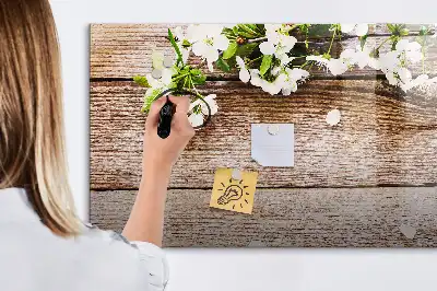 Pizarra de cristal magnética borrable con diseño de flores sobre madera