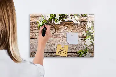 Pizarra de cristal magnética borrable con diseño de flores sobre madera