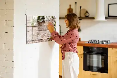 Pizarra de cristal magnética borrable con diseño de flores sobre madera