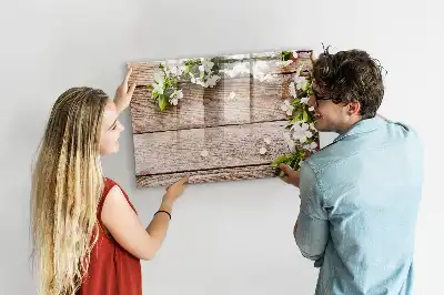 Pizarra de cristal magnética borrable con diseño de flores sobre madera
