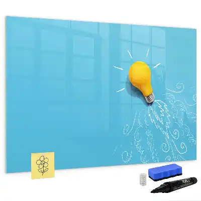 Pizarra magnética de pared con rotulador con dibujo de una bombilla