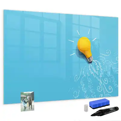 Pizarra magnética de pared con rotulador con dibujo de una bombilla