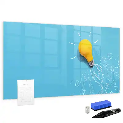 Pizarra magnética de pared con rotulador con dibujo de una bombilla
